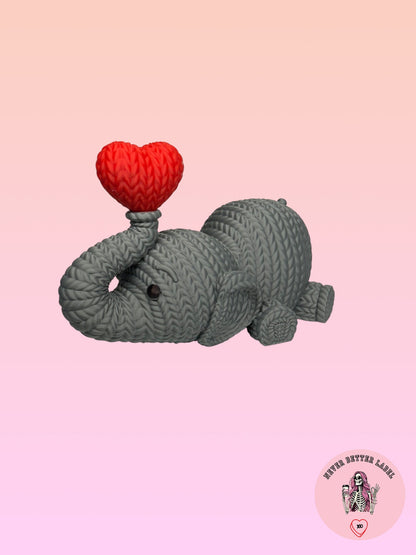 Elephant Holding Heart